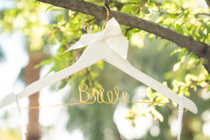 wedding hanger that says bride