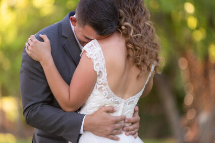 bride and groom embracing