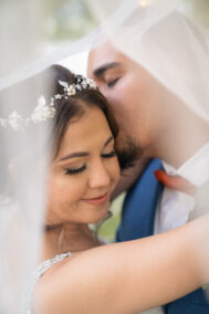 groom kissing bride