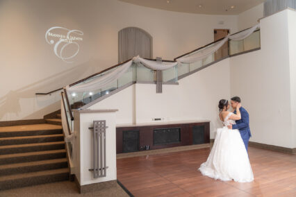 bride and groom dancing