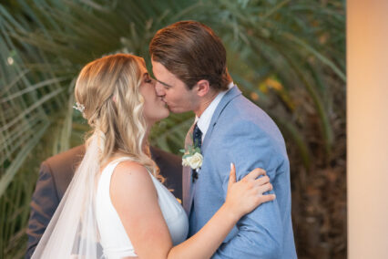 bride and groom kissing