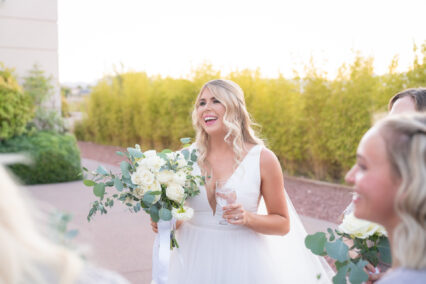 bride holding flowers