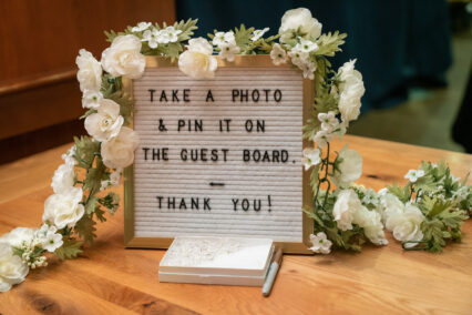 take a photo and pin it on the guest board sign