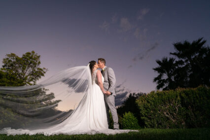 bride and groom kissing