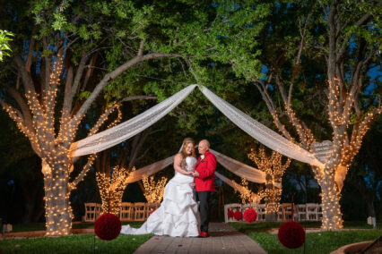 bride and groom at alter