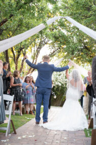 bride and groom walking down the aisle