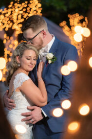 groom holding bride