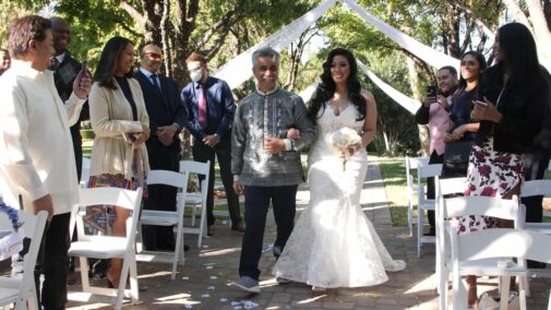 father walking bride down aisle