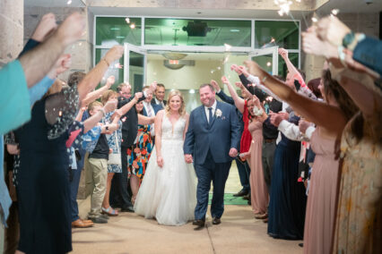 bride and groom leaving wedding