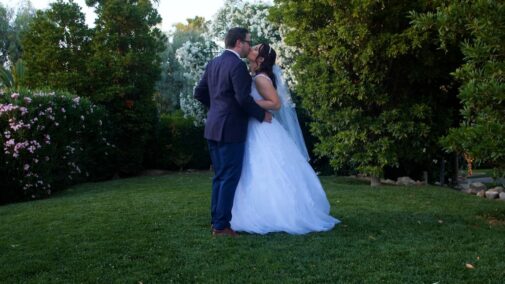 bride and groom kissing