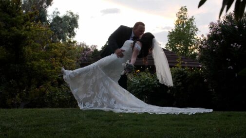 groom kissing bride