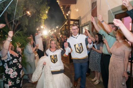 bride and groom wearing golden knights jerseys