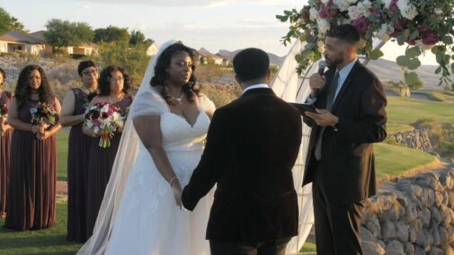 bride and groom at alter